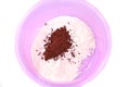 Mix cocoa powder and flour in a plastic bowl membuat kue muffin Royalty Free Stock Photo